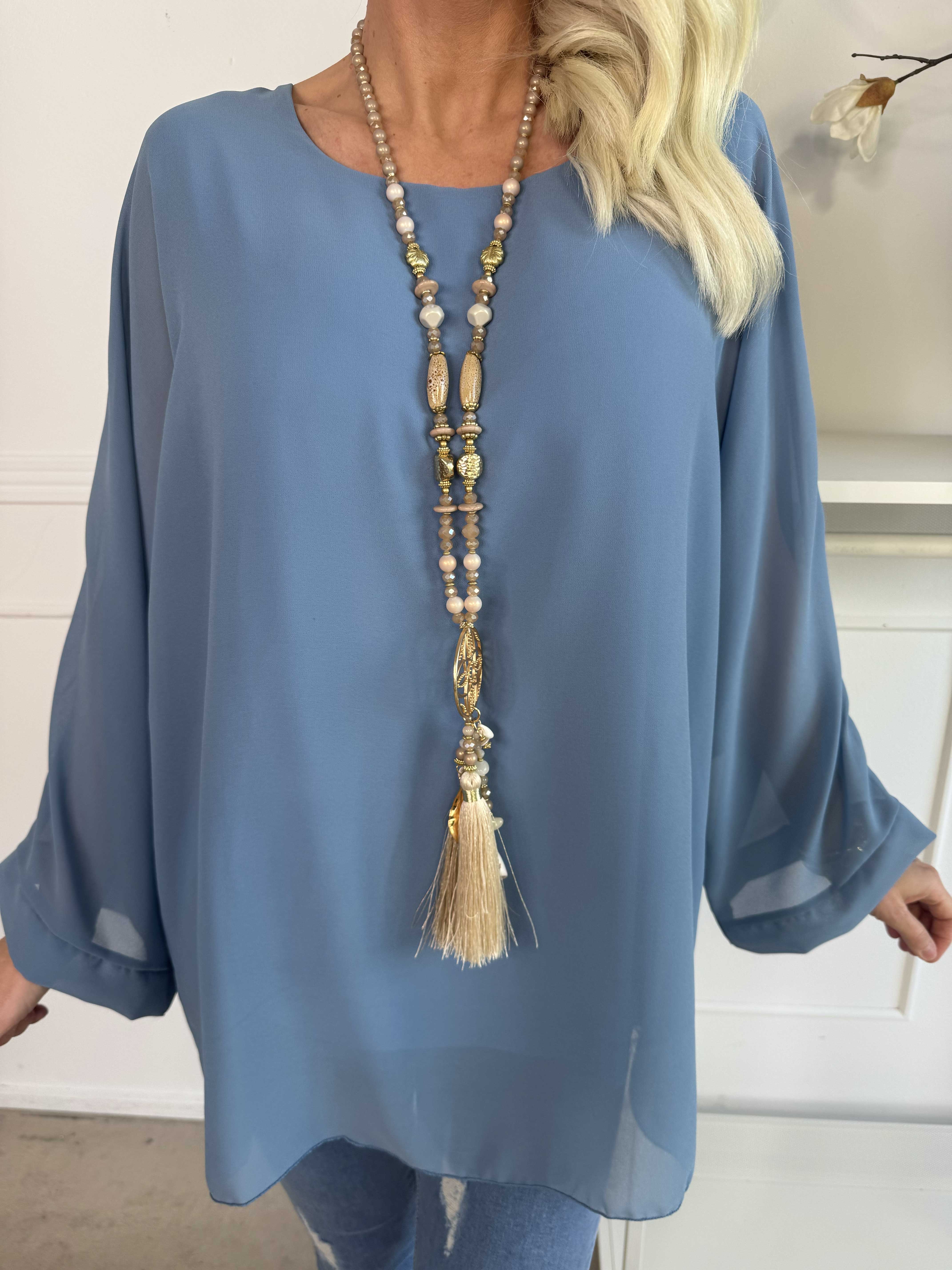 Flores - Tunika med chiffonglager och halvgenomskinliga ärmar